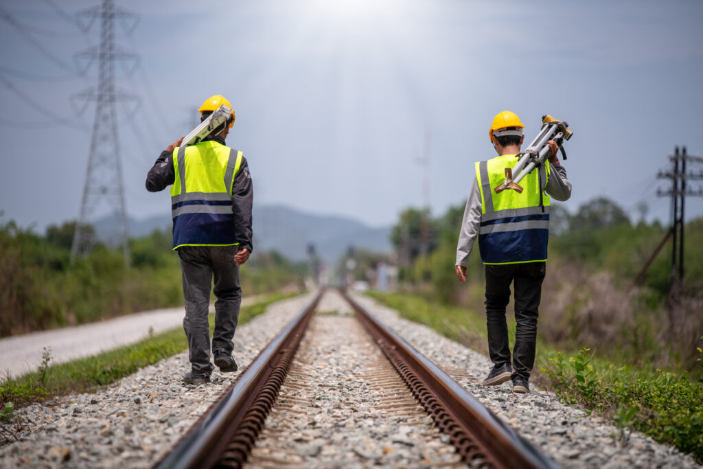 helfer im Bahnbetrieb